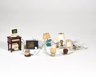 Electric Dollhouse Accessories | Wired electrified dollhouse lighting and other miniature dollhouse accessories, primarily table lamps, including a Chinese style caparison horse, a brass lamp, mid-century wood lamp, crystal oil lamp, and a Kermit and Miss Piggy lamp; plus an electrified miniature television (with Miss Piggy on the screen), and a home computer with printer [not electrified] - h. 4 x w. 1.5 x l. 2.25 in (computer station)
