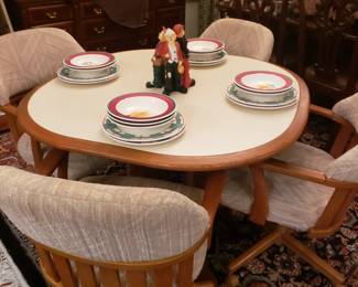 Game/dining table w swival rocking chairs
