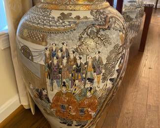 “Fine pair of antique Japanese porcelain vases, Satsuma, late 19th C., both signed near base by artist, Yoshi Fune, one with red seal. Of Baluster form, each intricately painted with figural scenes, one of women, one of men. Each with everted rim with brocade band at neck, to swelled body. Polychrome palette, highlighted with gilt. Each 24” high, 9 ¾” diameter at top.” Appraised value as of 7/21/1990 was $3,500."