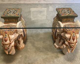 Elephant Garden stools with glass top.