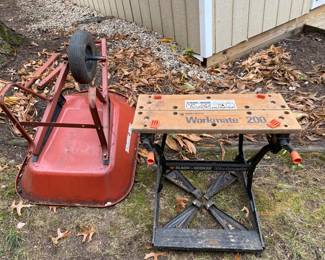 Wheelbarrow and Workmate 200.
