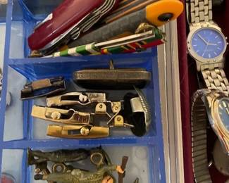 Pocket knives, belt buckles and toy soldiers.