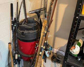 Shop vac and fishing poles.
