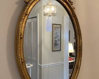 Italian oval shape giltwood mirror.