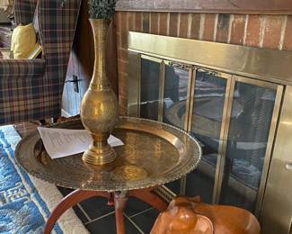 Moroccan brass tray on spider leg base and two amazing mahogany carved elephants.