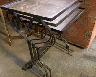 Vintage cast iron nesting outdoor tables.