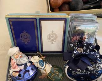 Naval Christmas ornaments and playing cards.