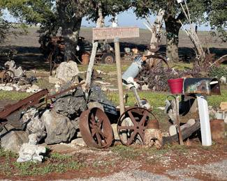 Old Drill Bit, Iron Wheels, Rocks, Carlson Street Sign