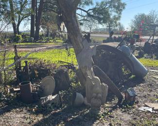 Iron Wheels, Concrete Eagle (as is) This sale has many concrete statues as the homeowner loves them and wanted to give many a home in their as is condition! Several are in good condition!  She loves them all equally! 