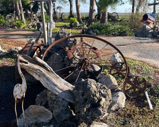Iron Wheel, Rocks, Metal Birds