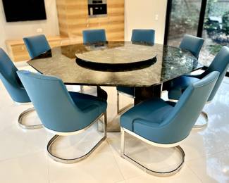 If taken as a package the table and chairs are priced $7,500 (Priced higher if you break up the set)