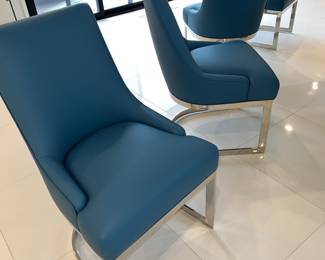 View of the other 4 blue on silver dining room chairs (8 total available)