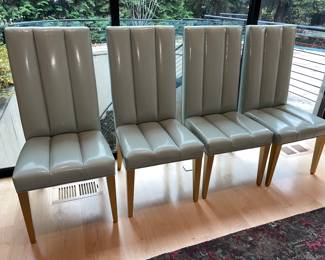 Detailed view of teal colored leather chairs