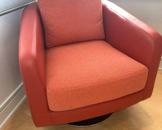 Orange leather/fabric swiveling armchair (1 of 2)