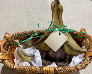 Set of (4) wooden Ducks in basket