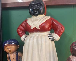 Antique cast iron woman. 