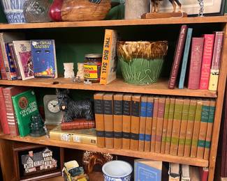 Mallard duck, large collection of vintage and antique books, and Star burst Ohio pottery
