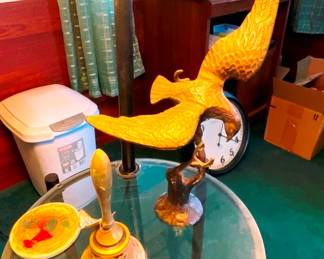 Heavy brass standing eagle, with a carved brass bell
