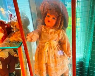 Antique bisque doll in case, they will be sold separately 