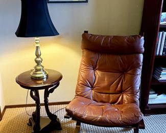 Classic leather siesta chair, footstool, Swan Mahogany side table, brass lamp