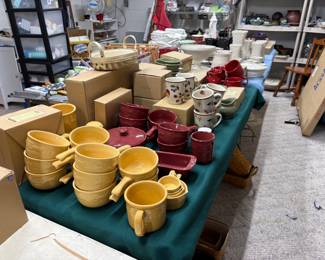 . . . a tone of Longaberger pottery pieces and 100 baskets