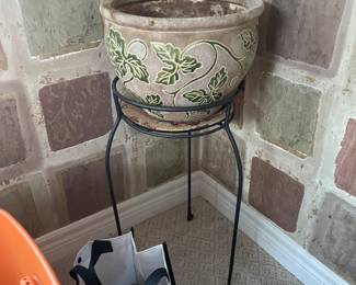 . . . nice wrought-iron plant stand and planter