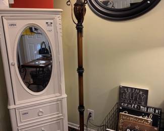 Mirrored Armoire,  Metal Baskets, Decorative Signs, Metal Floor Lamp, 