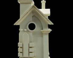 Whimsical Hand Carved And Painted Birdhouse. Sturdy Wooden Construction. Intricate Architectural Details. Provides Safe Haven For Feathered Friends.
