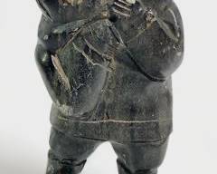 Vintage Canadian Inuit Native American Hand Carved Soapstone Man Holding a Seal
