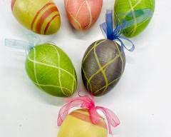 Six Hand Painted Decorative Wood oversized Easter Eggs With Pastel Colors, Ribbons, And Stripes Or Diamond Patterns.
