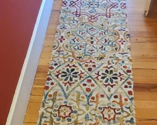 Colorful hooked rug runner
