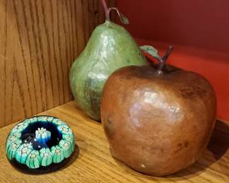 Hammered metal pear and apple. 