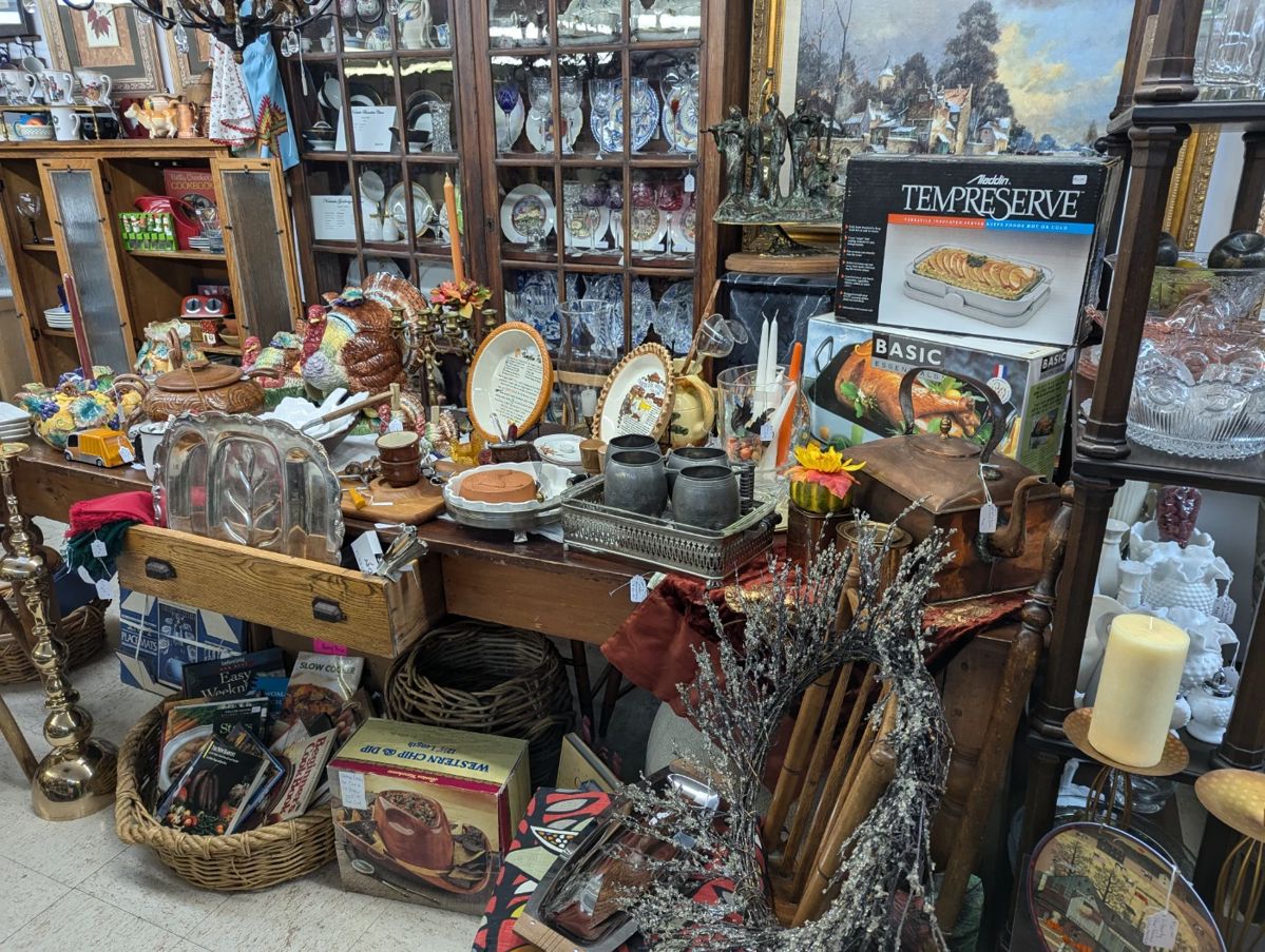 Lot's of fall decor, collectible Fitz & Floyd place settings for Thanksgiving, Turkey roaster, serving platters, fall table runner and much more!