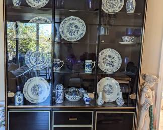 This China cabinet is the perfect size for small areas 