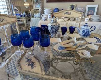We have a plethora of cobalt blue wine glasses, coffee mugs, vases, plates and more !!!   