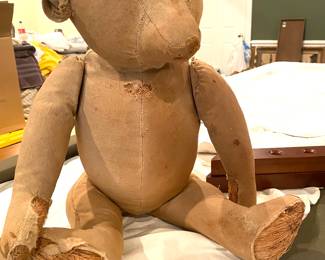 Antique muslin straw-stuffed bear