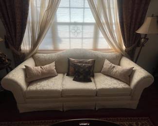 Cream floral demask upholstered sofa