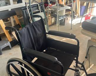 Wheelchair, shower chair, sawhorses, ladders, tools