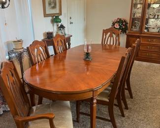 Basset dining table (as is, see next photo) with six chairs 57”L with 18” leaf x  39.5“ W x 29“H