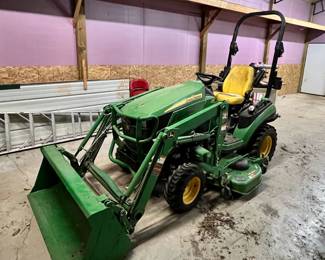 John Deere 1025R tractor with less than 200 hours 