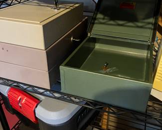 Lockboxes (with keys) - the one on the right is fire 'proof'. 