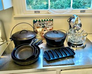 Griswold Dutch cast iron oven, two Wagner cast iron skillets and others