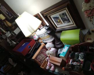 Clowns, toys, boxes, trays, clocks, DVDs, electronics wall shelves.