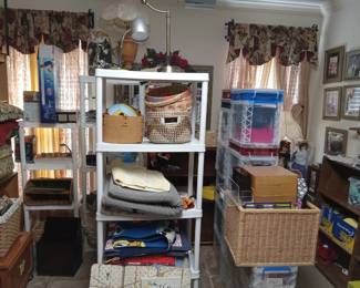 Office supplies, dolls, books, bookshelves, cabinets.