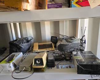 3376  Magellan GPS, Emerson Slimline Telephone, LGTM510 Cell Phone, JC Penny Telephone Clock Radio 