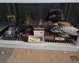 3370  Porcelain Dolls, Duck Dynasty Chia Pet, Wooden Music Box, Stuffed Animals 