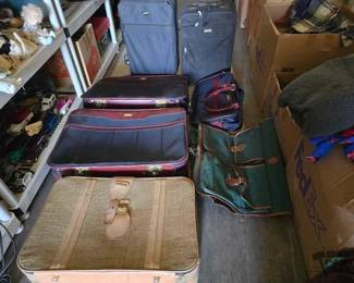 3242  6 Suitcases and 1 Garment Bag 
