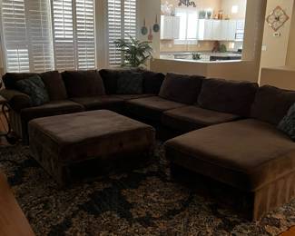 Sectional Sofa w Attached Chaise and Ottoman Napa Groovy Chocolate, End Table, Table Lamp, Faux Palm