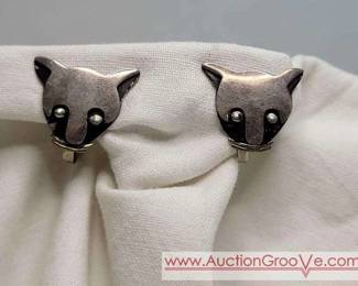 2 Earrings in form of stylized Cat faces