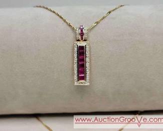 3 14K Gold Rectangular pendant with oval bale